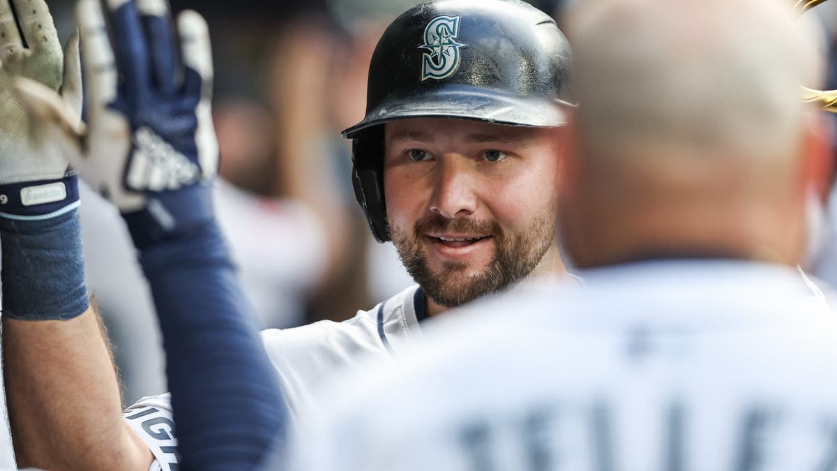 Cal Raleigh celebrates hitting a grand slam against the Boston Red Sox at T-Mobile Park on June 17, 2025. (Photo by Olivia Vanni/Getty Images)