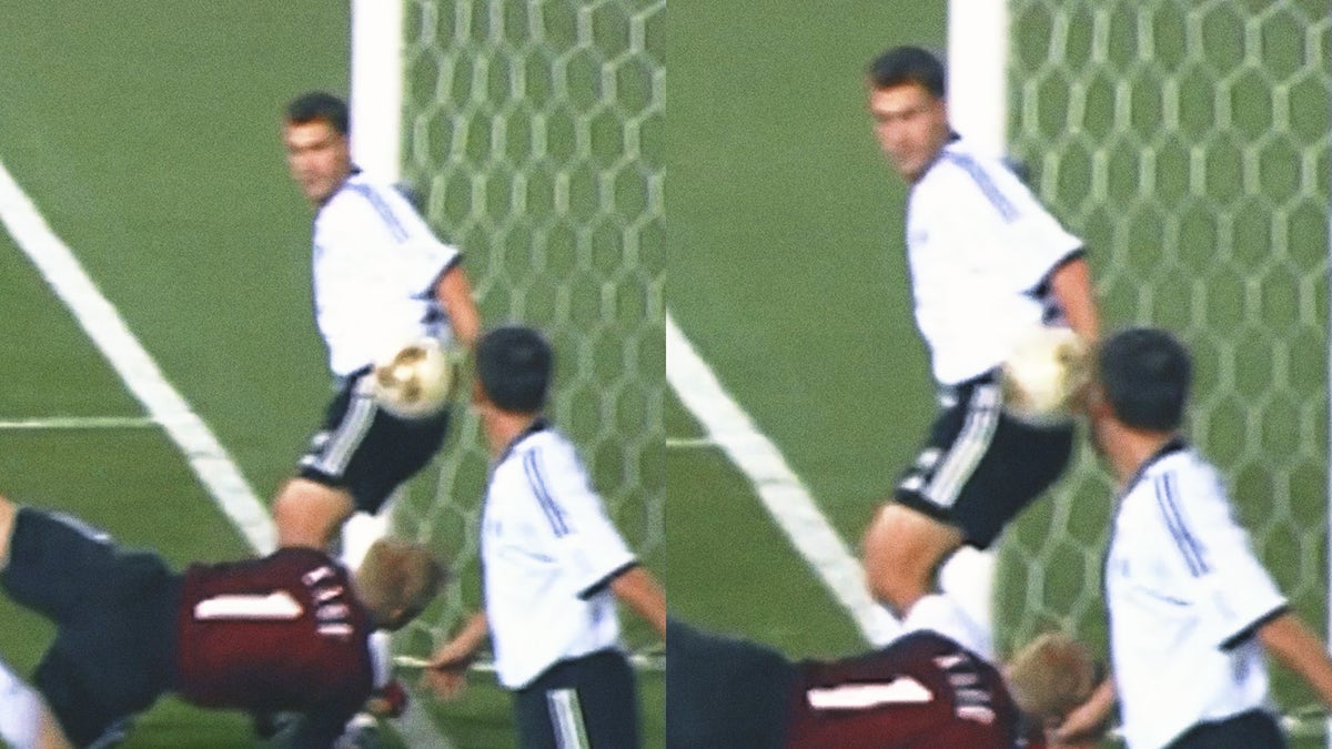 German midfielder Torsten Frings wasn't called for a handball on this play.