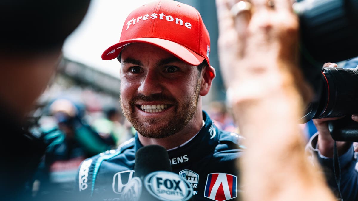 Kyle Kirkwood is all smiles after his victory in Detroit.