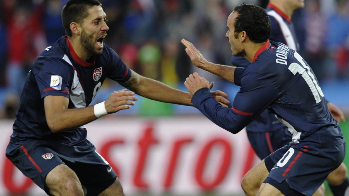 Clint Dempsey, playing alongside Landon Donovan at the 2010 World Cup, has also questioned why current USMNT players are skipping out games. (TIMOTHY A. CLARY/AFP via Getty Images)