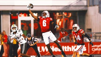 Next Story Image: Wisconsin, NIL Collective Sues Miami for Alleged Transfer Tampering