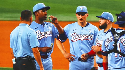 MLB Trending Image: Texas rookie keeps scoreless start intact thanks to ball boy and pickle juice