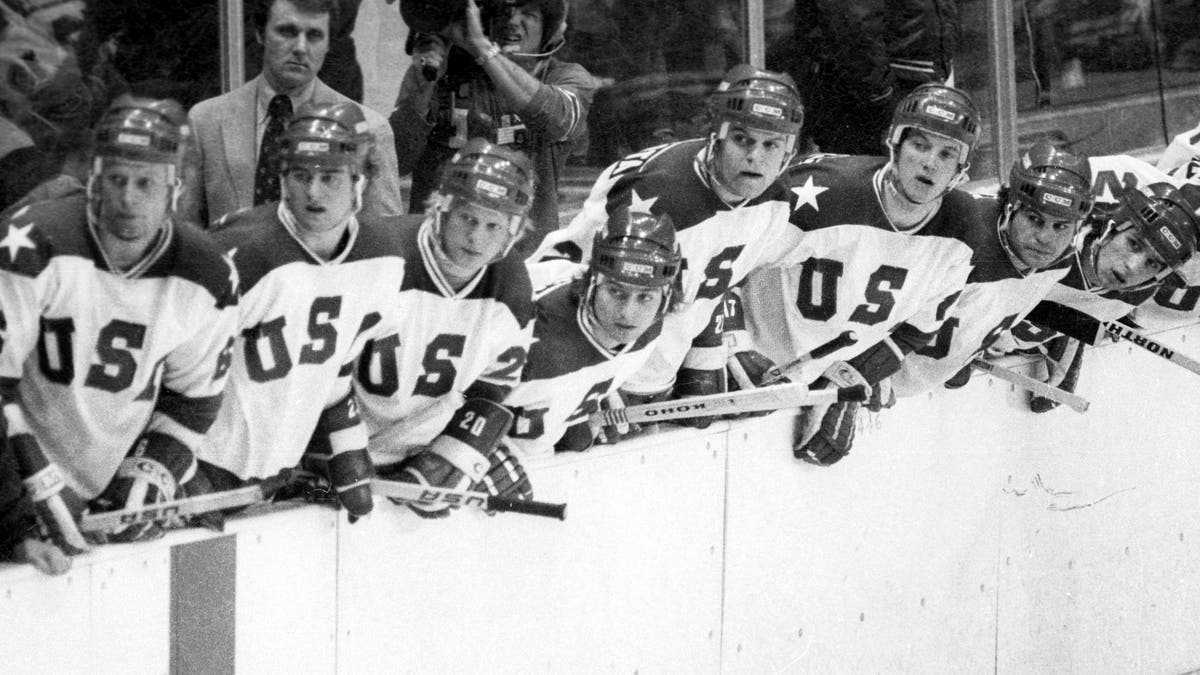 United States coach Herb Books and his players look to the action on the ice during a medal round game against the Soviet Union at the 1980 Winter Olympics. (Photo by Tom Sweeney/Star Tribune via Getty Images)