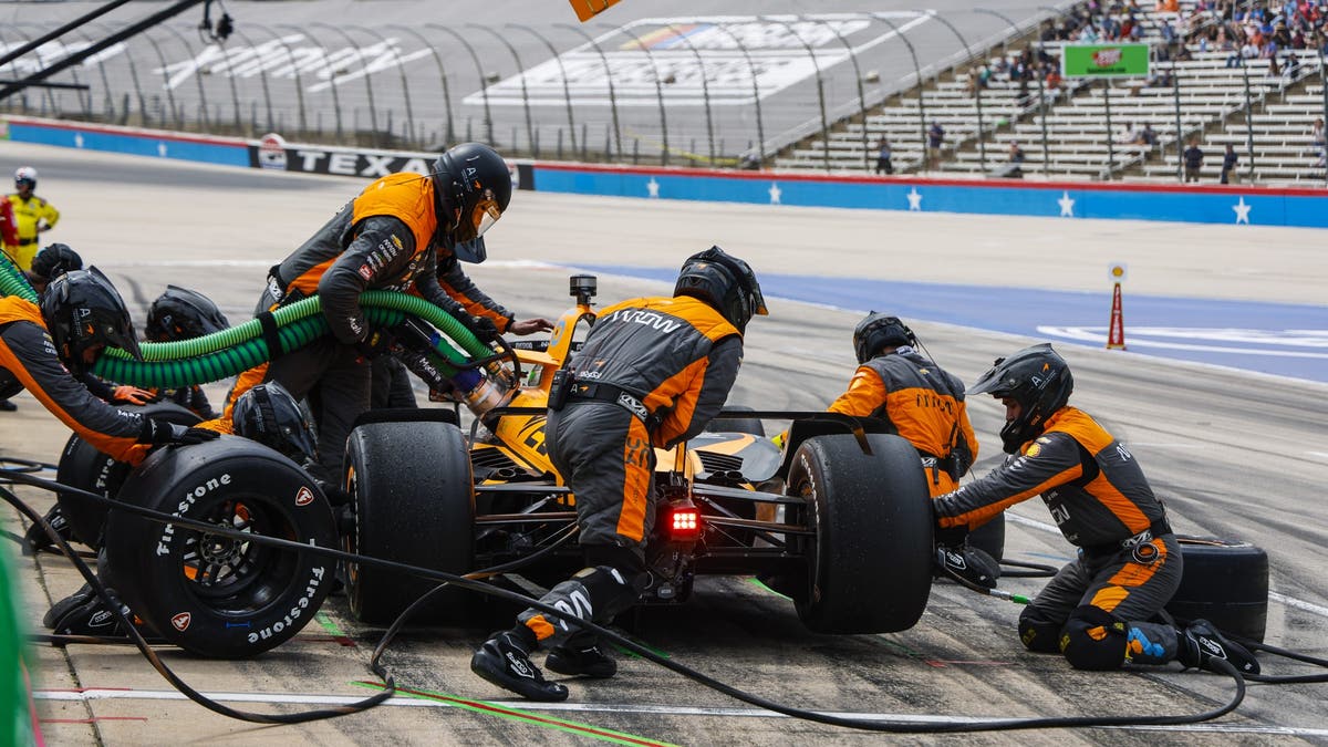 Pato O'Ward stops in his pit for tires and fuel during the NTT INDYCAR Series PPG 375 on April 2, 2023 at Texas Motor Speedway