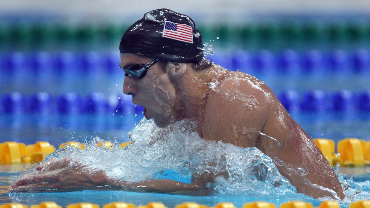 Michael Phelps swims breaststroke as he begins his medal haul with a world record in the 400 Individual Medley at the XXIX Olympiad in Beijing. (Photo by Steve Russell/Toronto Star via Getty Images)