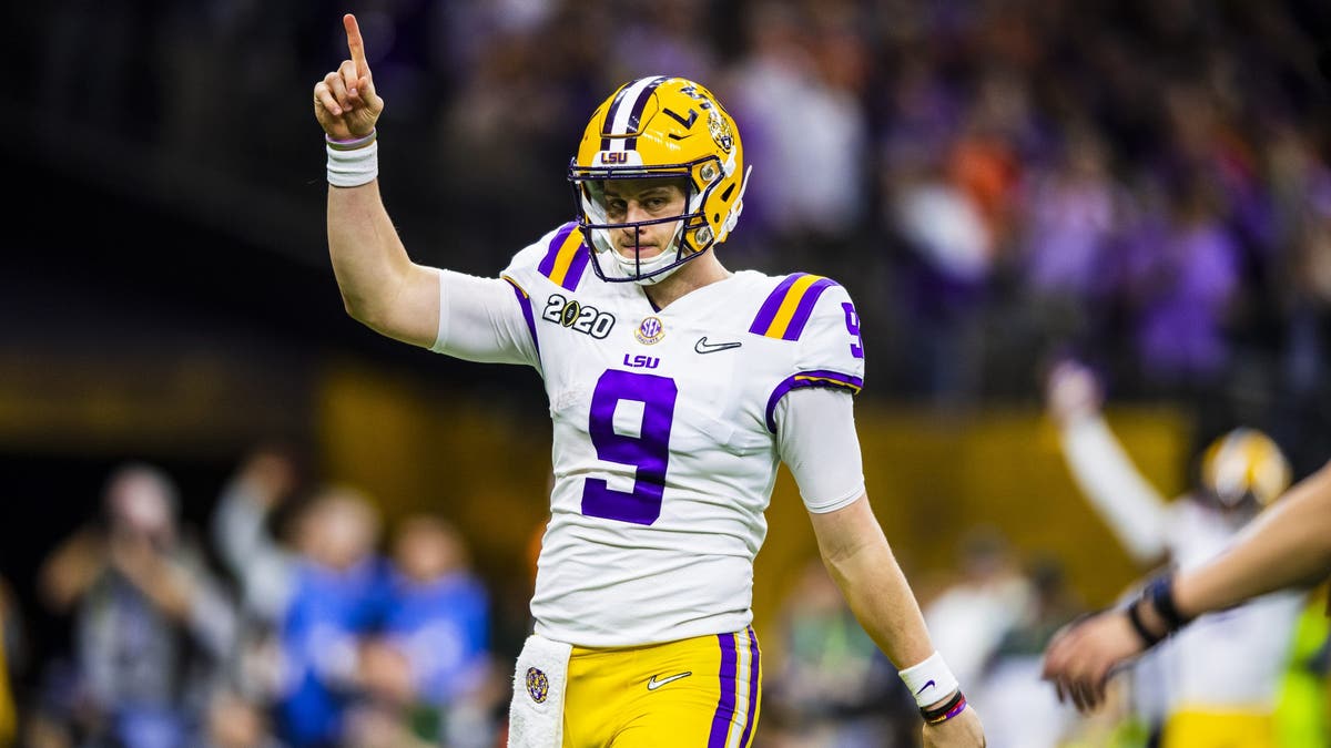 Joe Burrow threw for 5,671 yards and 60 TDs in LSU's 2019 championship season. (Photo by Gus Stark/LSU/University Images via Getty Images)
