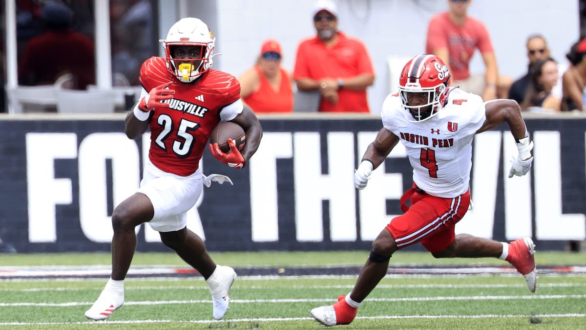 Isaac Brown often had opposing defenders chasing after him in his freshman season at Louisville. (Photo by Justin Casterline/Getty Images)