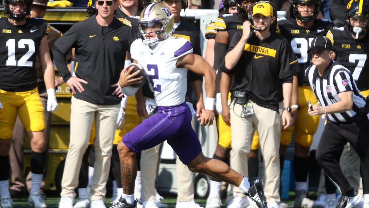 Washington QB Desmond Williams Jr. #2 goes up the field during the first half on a keeper against Iowa. ?(Photo by Matthew Holst/Getty Images)