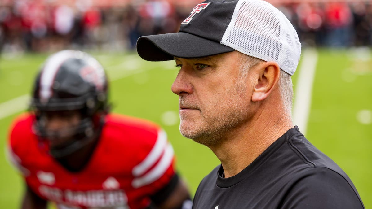 Texas Tech head coach Joey McGuire walks across the field before the game against Baylor. (Photo by John E. Moore III/Getty Images)