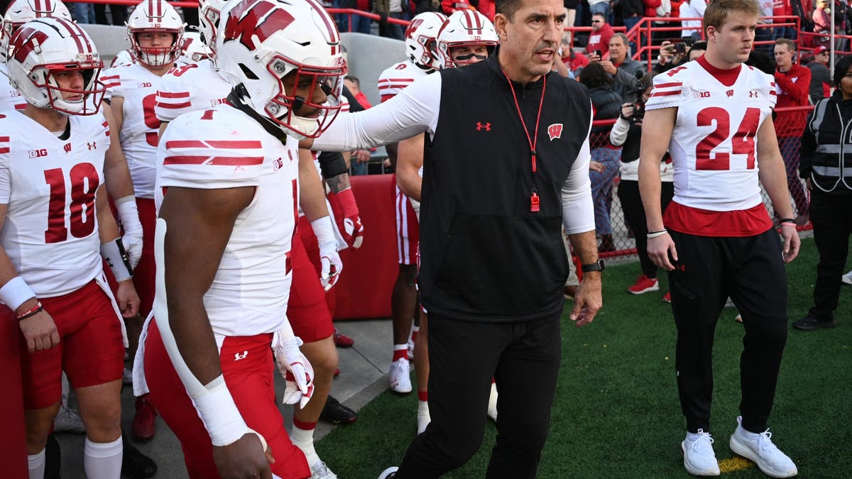 Wisconsin head coach Luke Fickell leads the team on to the field before a game against Nebraska. (Photo by Steven Branscombe/Getty Images)