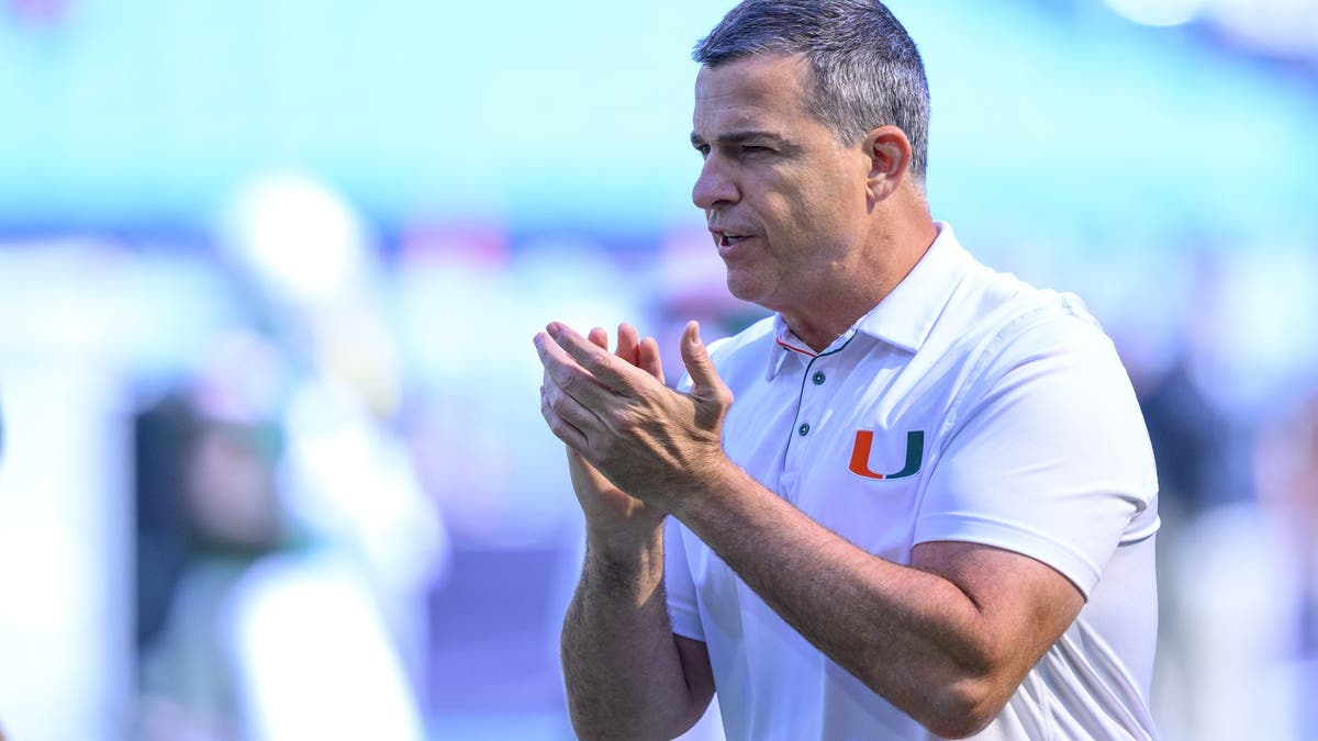 Miami head coach Mario Cristobal claps his hands on the field before a game between the Wake Forest Deacon Demons and the University of Miami Hurricanes. (Photo by Doug Murray/Icon Sportswire via Getty Images)