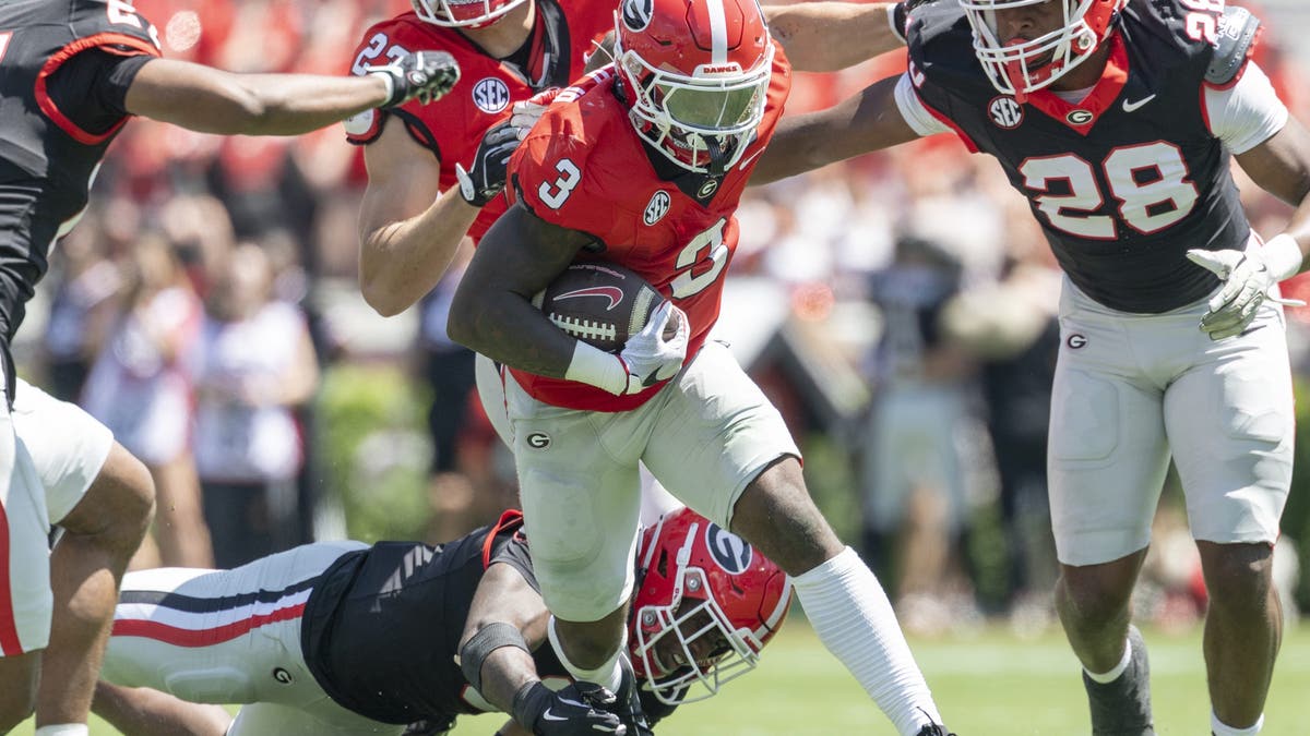 Nate Frazier #3 of the Georgia Bulldogs runs with the ball during the University of Georgia Spring Game. (Photo by Steve Limentani/ISI Photos/Getty Images)