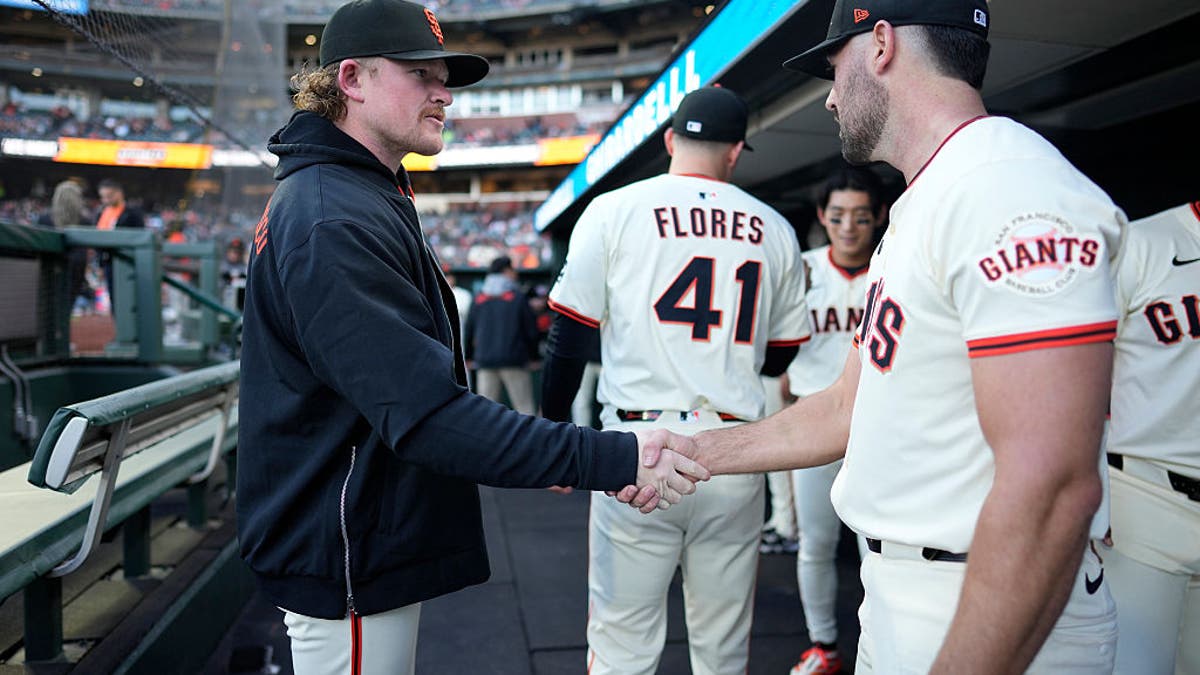 Logan Webb #62 and Robbie Ray #38 of the San Francisco Giants prepare for the game at Oracle Park on April 21, 2025 in San Francisco. (Photo by Suzanna Mitchell/San Francisco Giants/Getty Images)