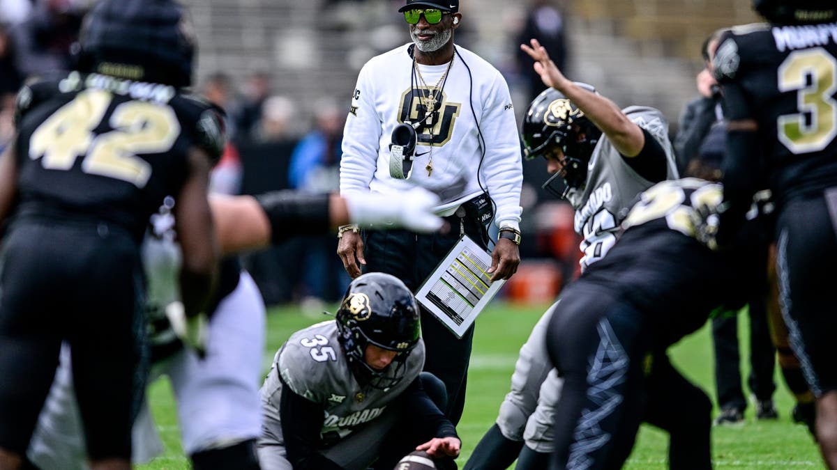 Colorado head coach Deion Sanders looks on as a field goal drill is attempted in the Black and Gold Spring Game at Folsom Field in April.