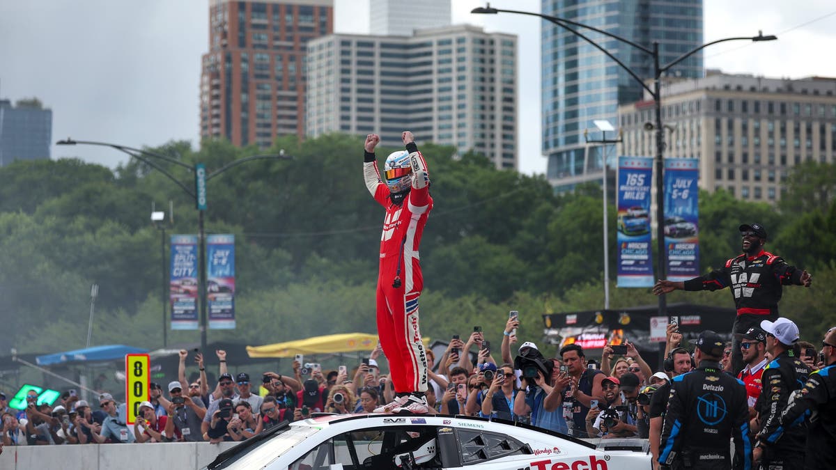 Shane Van Gisbergen held on to win in Chicago after a controversial finish.