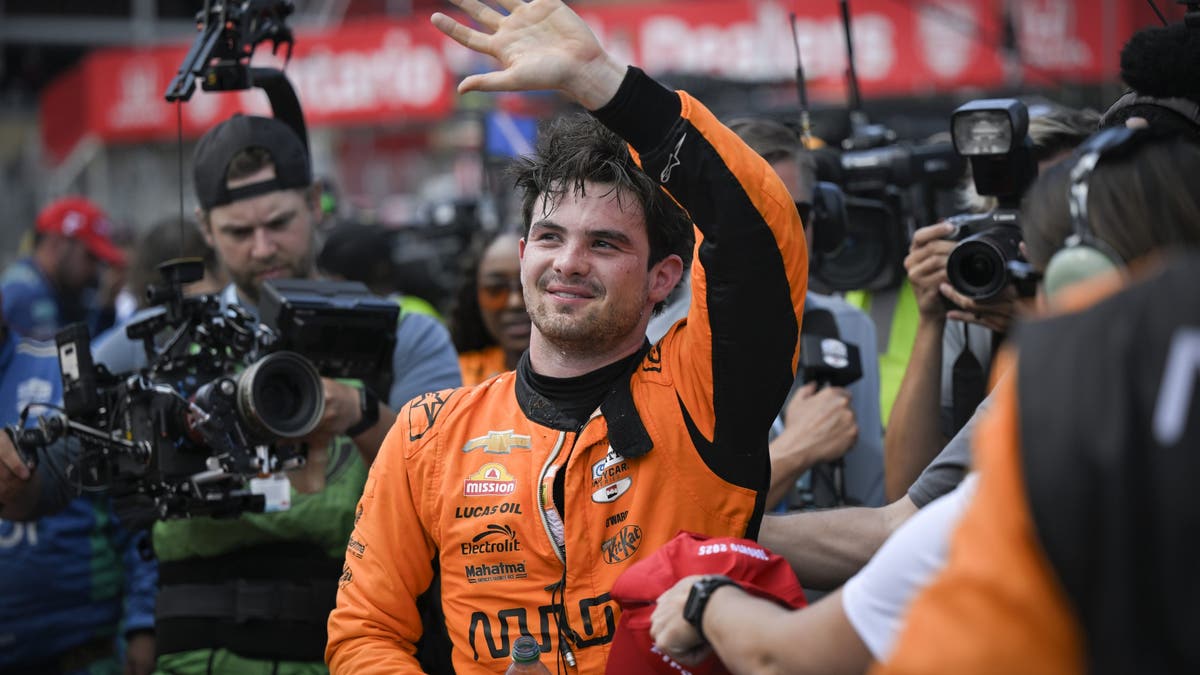 Pato O'Ward waves to crowd after winning INDYCAR's race at Toronto