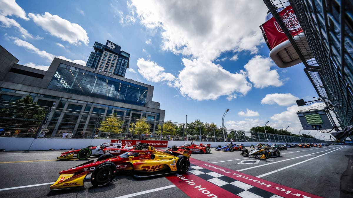Alex Palou and Marcus Armstrong at the start of the INDYCAR race at Toronto