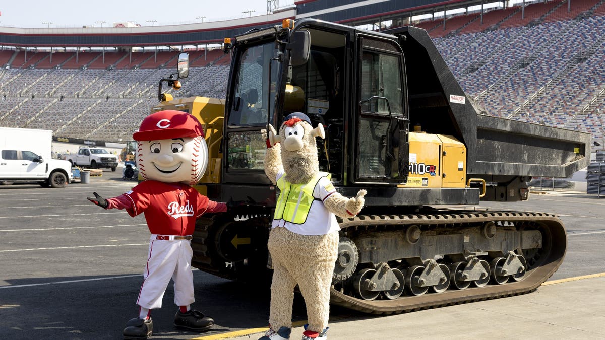 Cincinnati Reds mascot Mr. Red and Atlanta Reds mascot Blooper at Bristol Motor Speedway