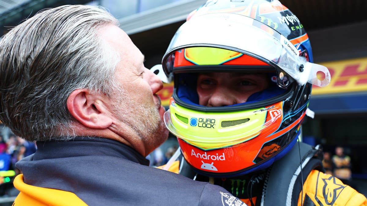 Race winner Oscar Piastri of Australia and McLaren and CEO Zak Brow celebrate in parc fermé during the F1 Grand Prix of Belgium?