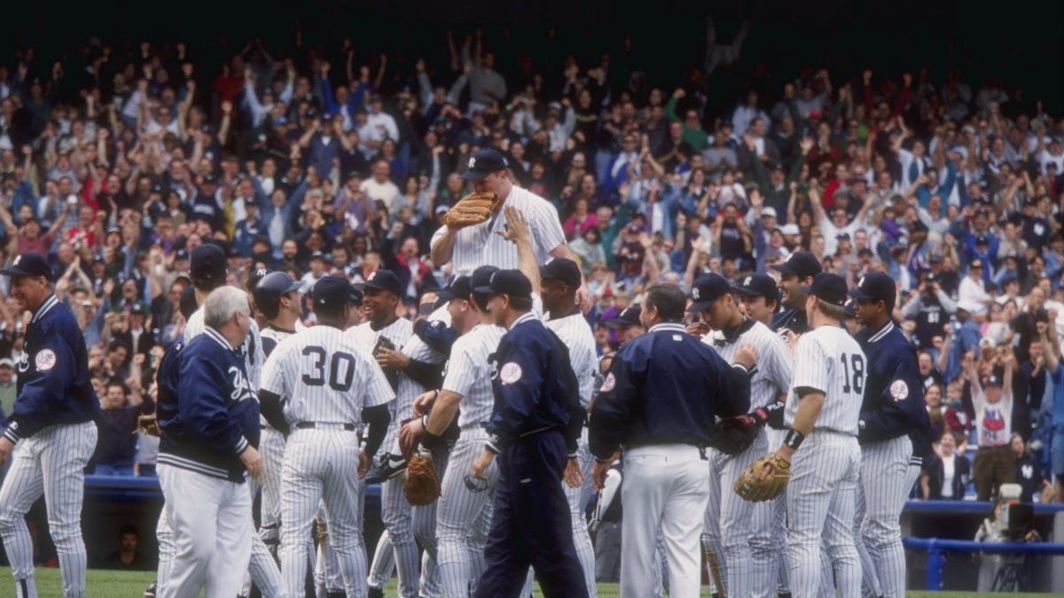 David Wells was carried off the field by his Yankees teammates after throwing a perfect game in 1998.