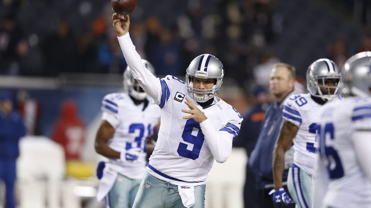 Tony Romo #9 is first in Cowboys history in both passing yards and passing touchdowns. (Photo by Joe Robbins/Getty Images)