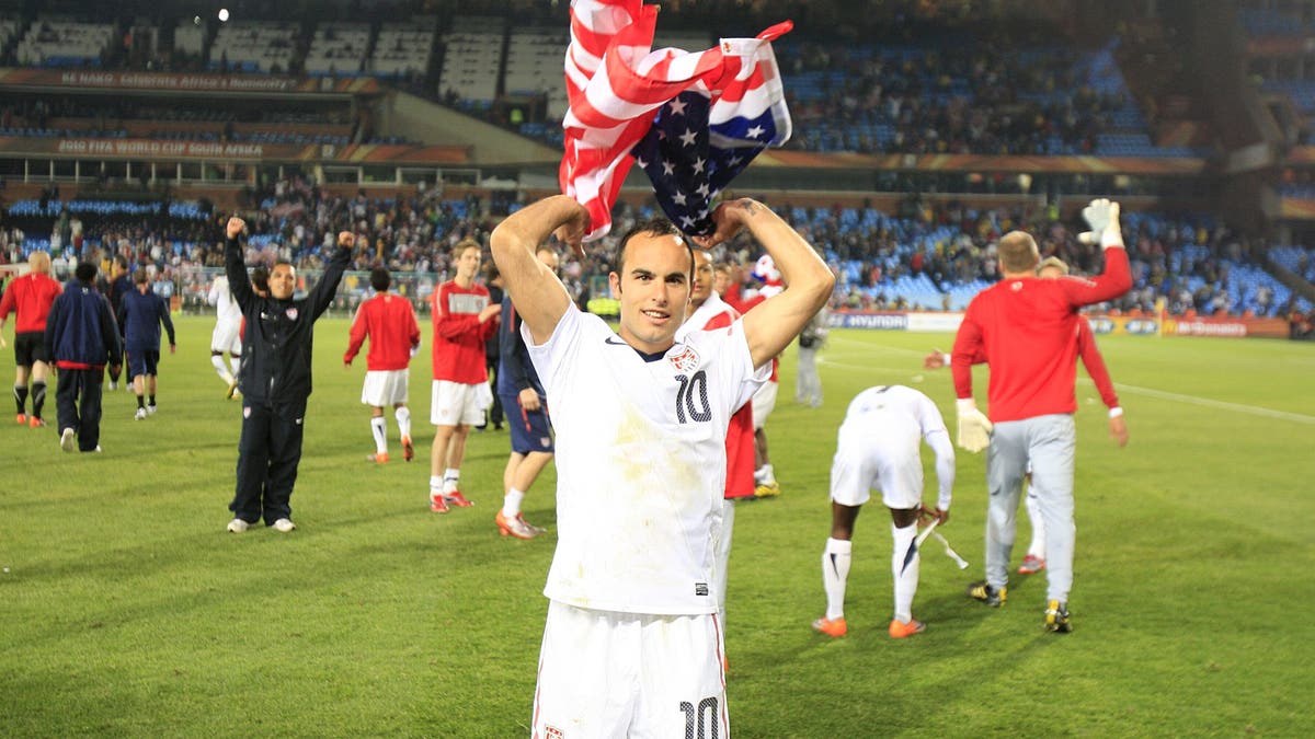 USA's Landon Donovan celebrates victory at the final whistle. ?(Photo by EMPICS Sport - PA Images via Getty Images)