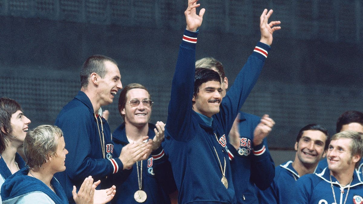 Mark Spitz, Steve Genter and Fred Taylor at the medal ceremony for the Men's 4 × 200 meter medley relay tournament at the 1972 Summer Olympics in Munich, West Germany (Photo by John G. Zimmerman/Sports Illustrated via Getty Images)