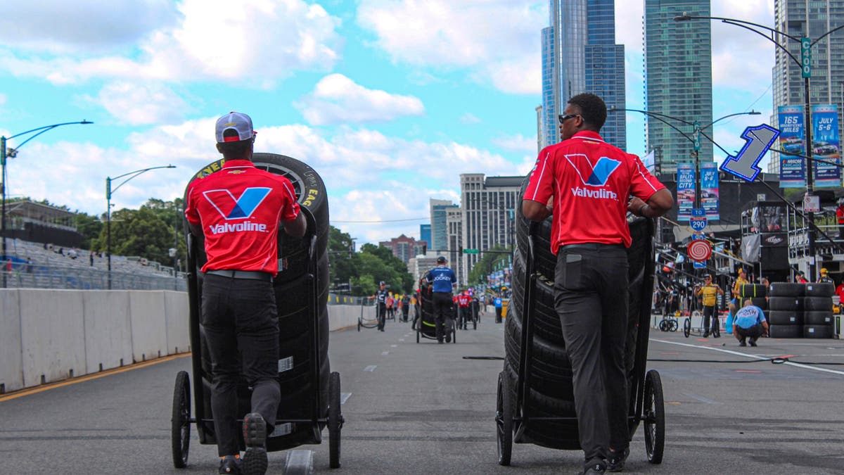 In anticipation of a third straight Chicago race featuring inclement weather, the rain tires rolled into pit road early on Sunday. The tires on the left are slicks, for dry conditions, while the tires on the right are rain tires. (Photo by Ed McGregor/FOX Sports)