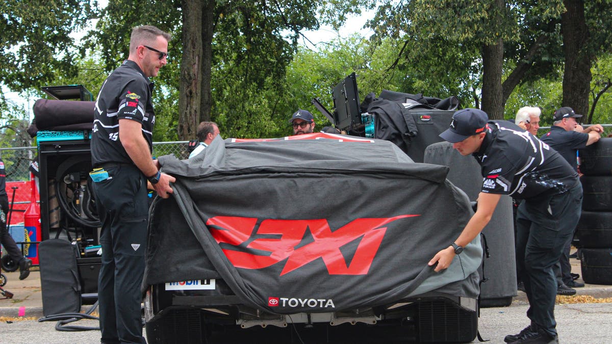 At 10 a.m., the cars could officially be uncovered, including the Jordan Brand Toyota driven by Tyler Reddick. (Photo by Ed McGregor/FOX Sports)