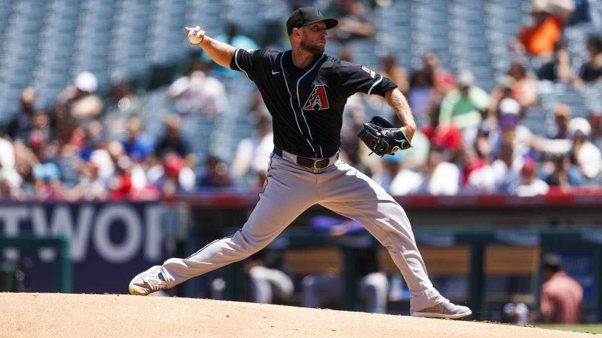 Merrill Kelly bolsters the Rangers' rotation for the rest of the season. (Photo by Ric Tapia/Getty Images)