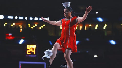 NBA Trending Image: Popular Unicycle Performer Red Panda Injured at Halftime of WNBA game