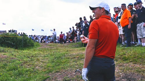 NEXT Trending Image: Dig That! Rory McIlroy Unearths Second Ball From The Rough at The Open