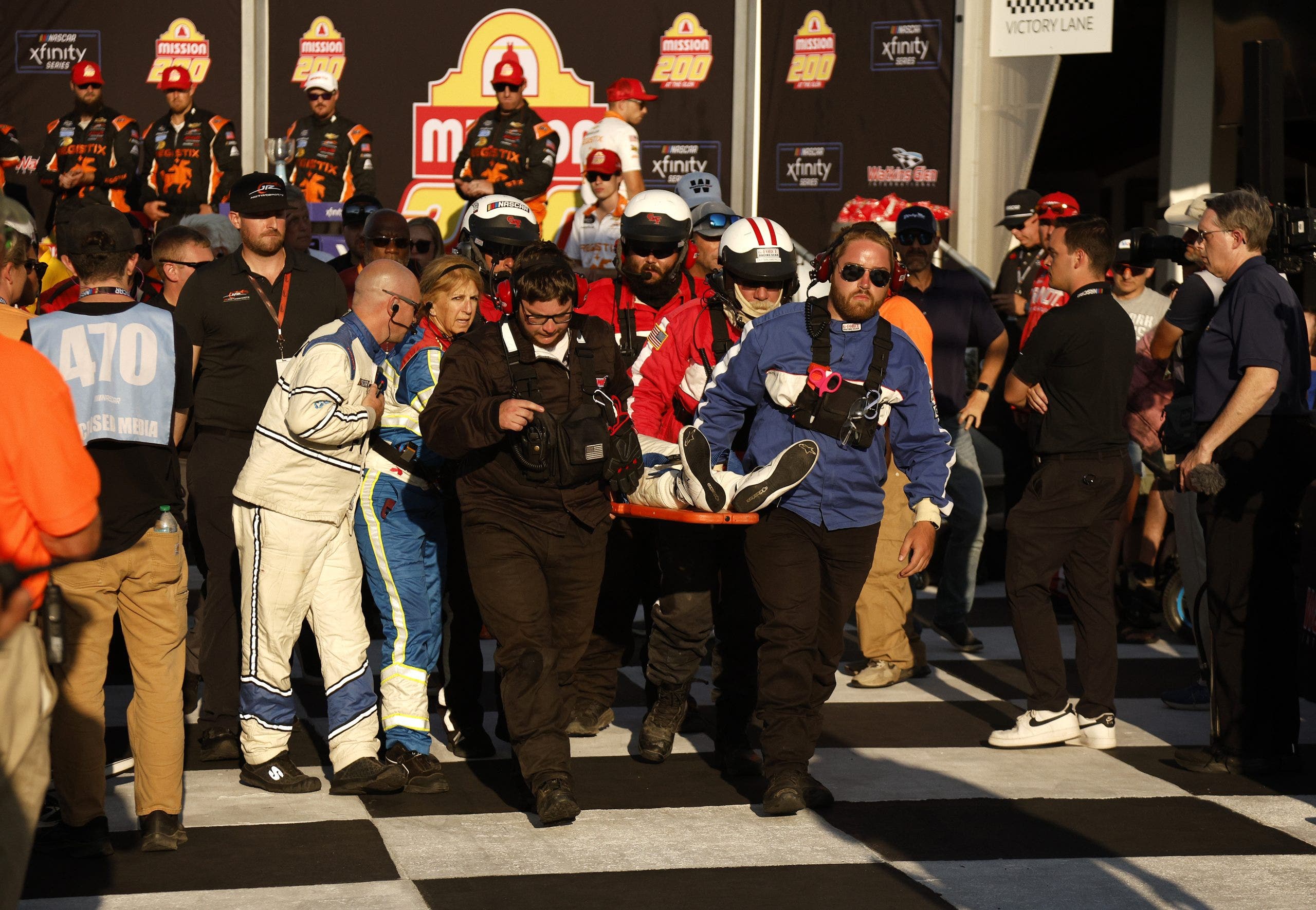Connor Zilisch as he was taken out on a stretcher following a fall in victory lane at Watkins Glen
