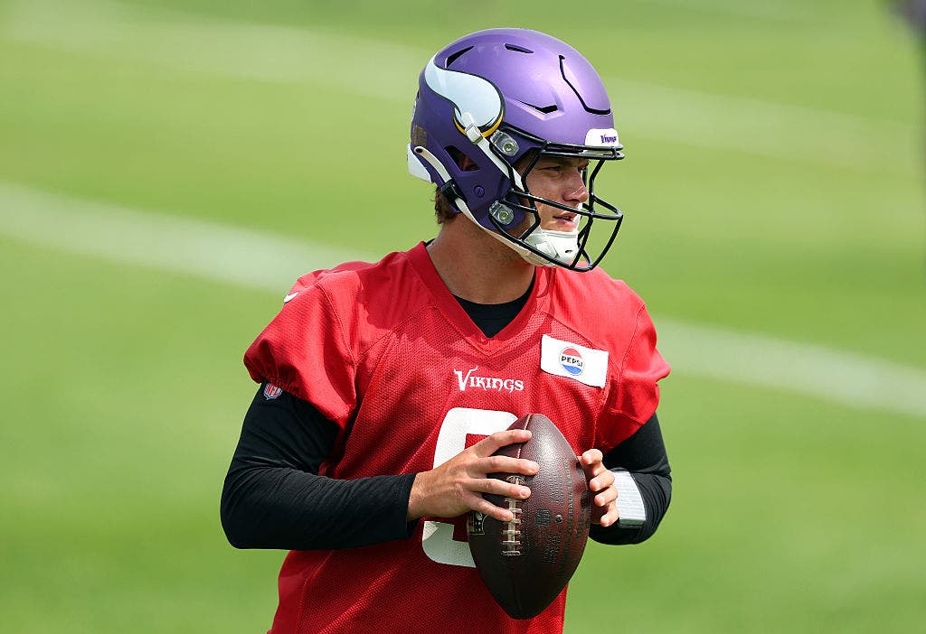 Late in training camp, J.J. McCarthy is working without some of Minnesota's top offensive playmakers. (Photo by David Berding/Getty Images)