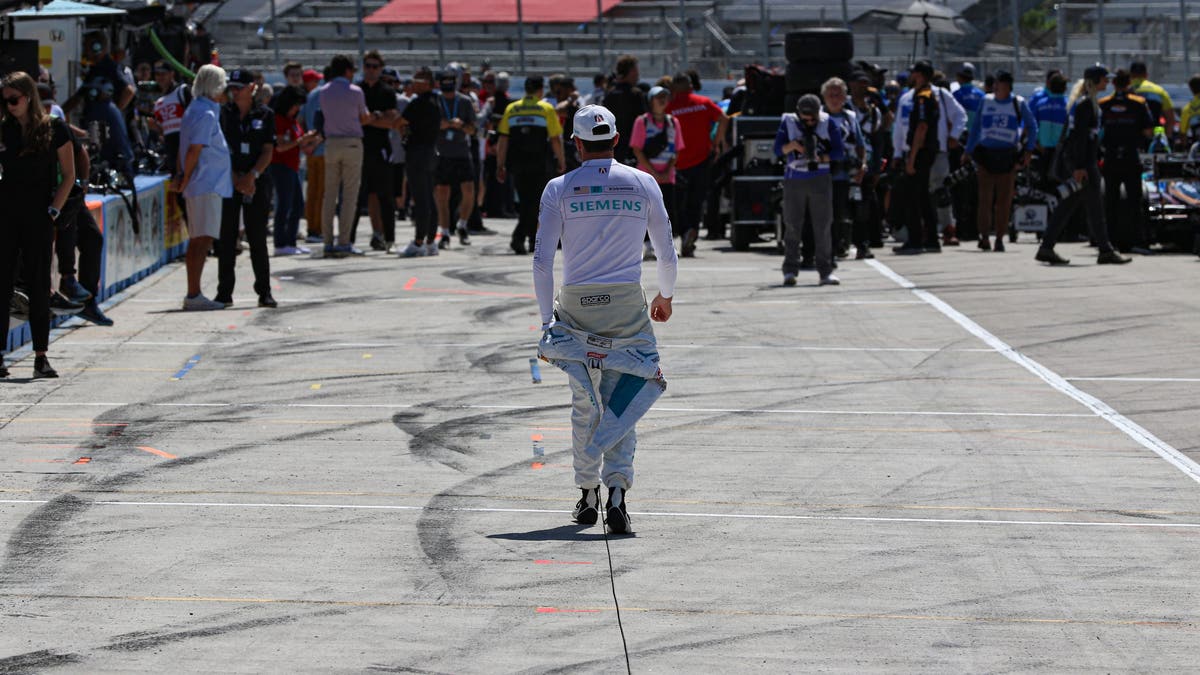 While awaiting his early afternoon qualifying run, Kirkwood takes a walk down pit road. (Photo by Ed McGregor/FOX Sports)