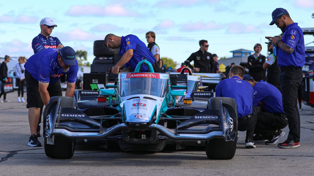 Early on race day, all cars go through a technical inspection to make sure they are in compliance with the acceptable measurements and weight. Here, the Andretti Global crew makes a few last-minute tweaks before inspection. (Photo by Ed McGregor/FOX Sports)