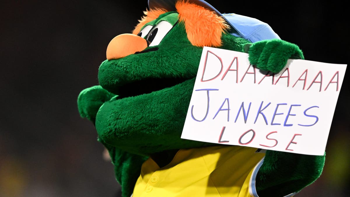 Wally the Green Monster makes his feelings known about Yankees. (Photo by Brian Fluharty/Getty Images)