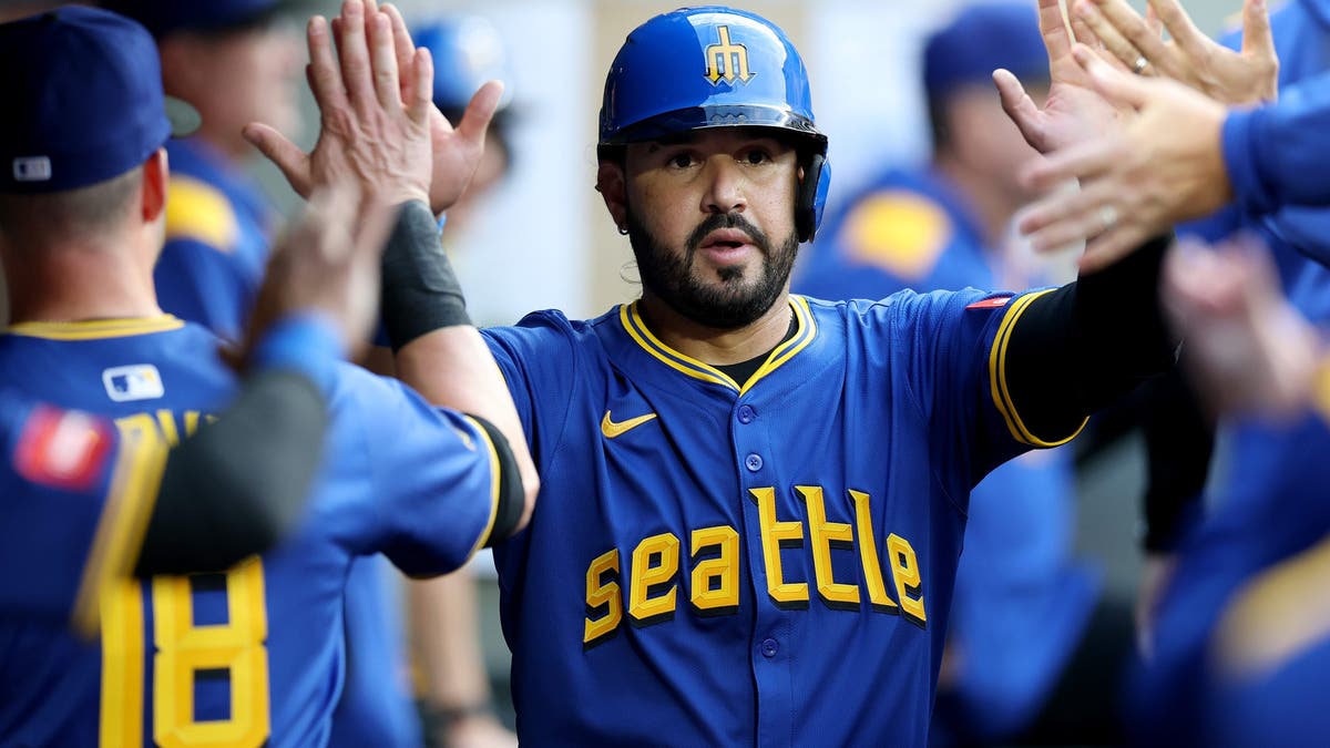 Eugenio Suárez celebrates a run during the fourth inning against the Texas Rangers at T-Mobile Park on July 31, 2025 in Seattle, Washington. (Photo by Steph Chambers/Getty Images)
