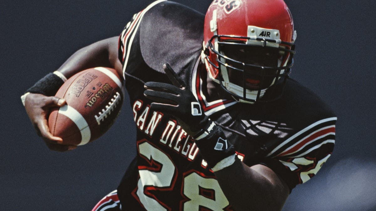 Marshall Faulk led the WAC in rushing yards in 1991, 1992 and 1993. (Photo by Mike Powell/Allsport/Getty Images)