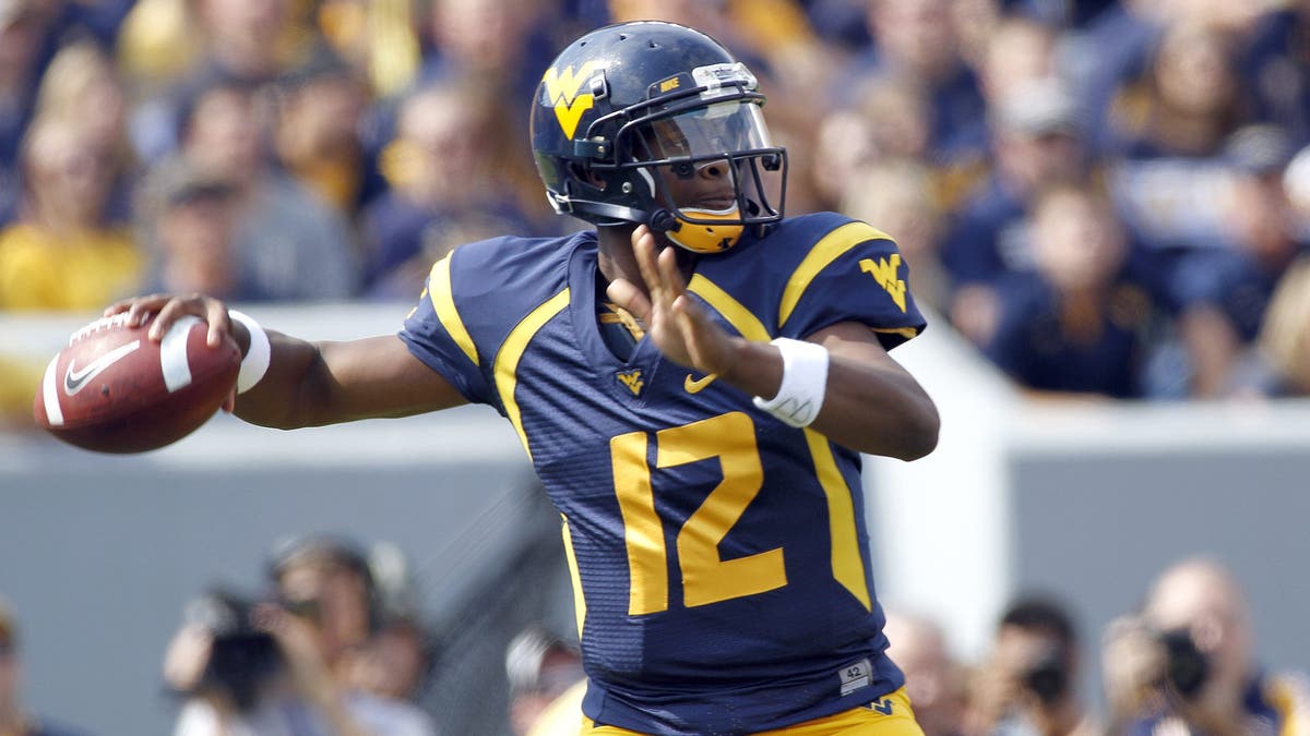Geno Smith led the Big 12 in passing touchdowns in both 2011 and 2012. (Photo by Justin K. Aller/Getty Images)