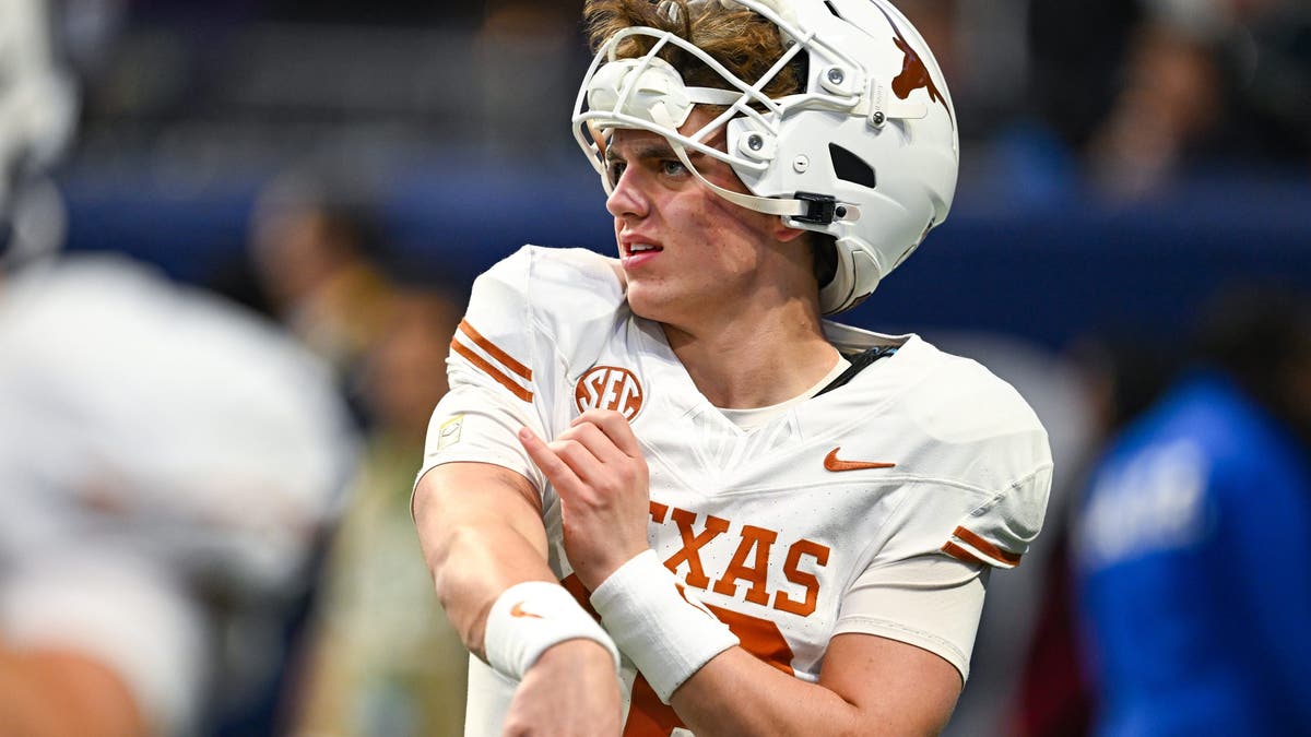 Texas quarterback Arch Manning (16) warms up prior to the start of the SEC Championship game between the Texas Longhorns and the Georgia Bulldogs on December 7th, 2024 at Mercedes-Benz Stadium in Atlanta, GA. (Photo by Rich von Biberstein/Icon Sportswire via Getty Images)