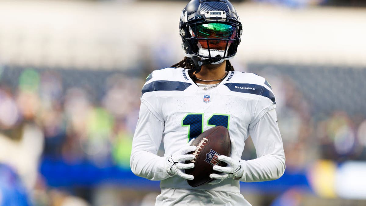 Jaxon Smith-Njigba #11 of the Seattle Seahawks runs after the catch before the game against the Los Angeles Rams at SoFi Stadium on January 5, 2025 in Inglewood, California. (Photo by Ric Tapia/Getty Images)