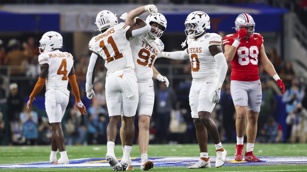 Colin Simmons #11 of Texas celebrates during a game against Ohio State. (Photo by CFP/Getty Images)