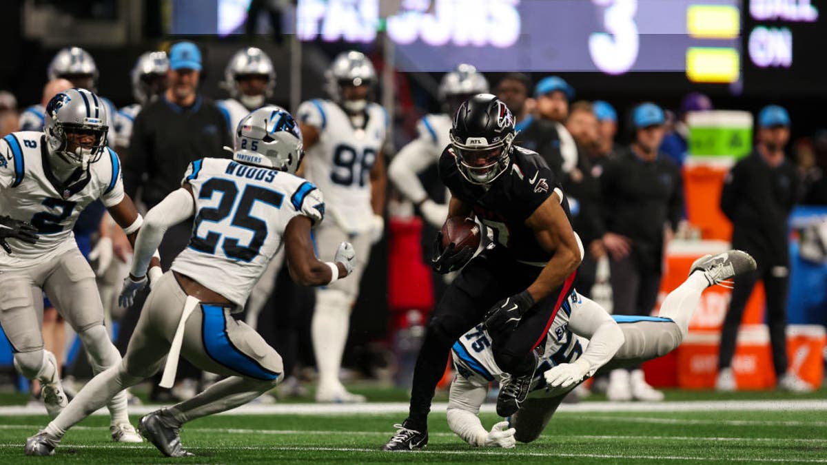 Bijan Robinson's cutting ability makes him a nightmare for opposing defenses. (Photo by Perry Knotts/Getty Images)
