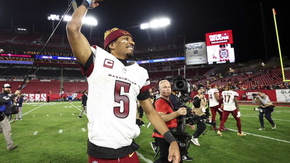Jayden Daniels arguably had the greatest rookie season ever for a quarterback in 2024. (Photo by Kevin Sabitus/Getty Images)