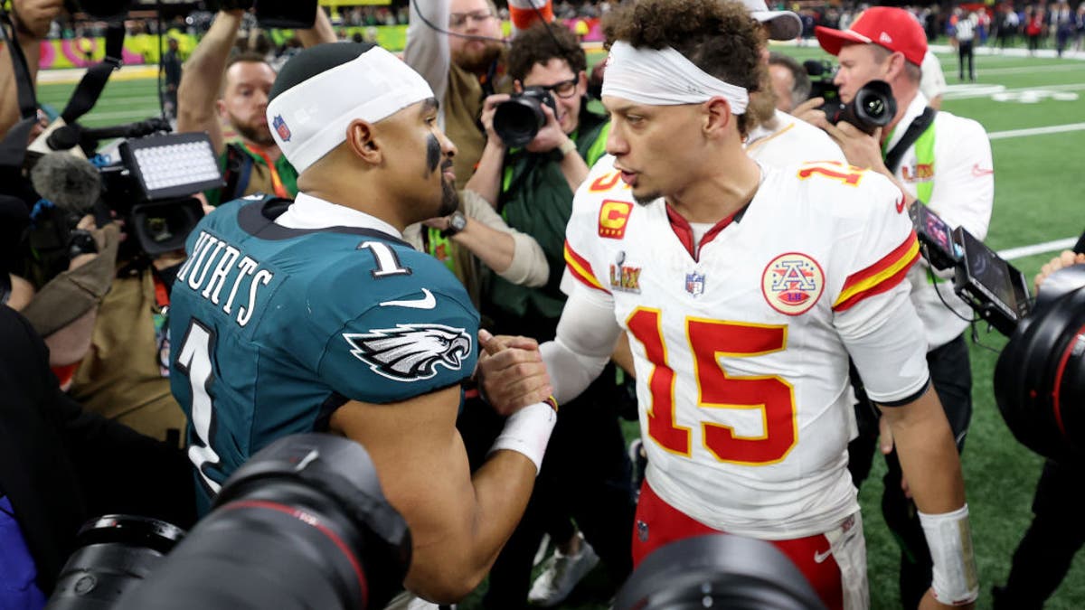 Jalen Hurts and Patrick Mahomes shake hands after Philadelphia beat Kansas City 40-22 to win Super Bowl LIX in New Orleans. (Photo by Jamie Squire/Getty Images)