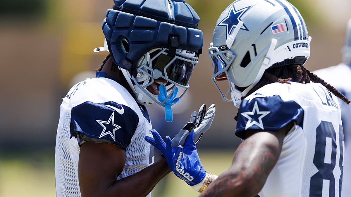 George Pickens #3 of the Dallas Cowboys celebrates with CeeDee Lamb #88 of the Dallas Cowboys during training camp practice at Staybridge Suites Oxnard on July 30, 2025 in Oxnard, California. (Photo by Ric Tapia/Getty Images)