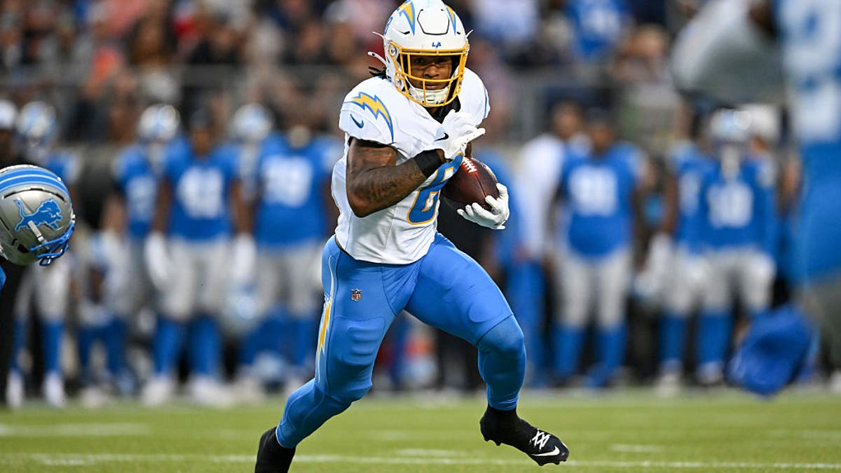 Omarion Hampton #8 of the Los Angeles Chargers carries the ball during the first quarter of the 2025 Pro Football Hall of Fame Game on July 31, 2025. (Photo by Nick Cammett/Getty Images)