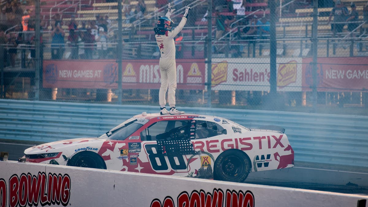 Connor Zilisch waves to the crowd after the win during the NASCAR Xfinity Series Mission 200 at the Glen