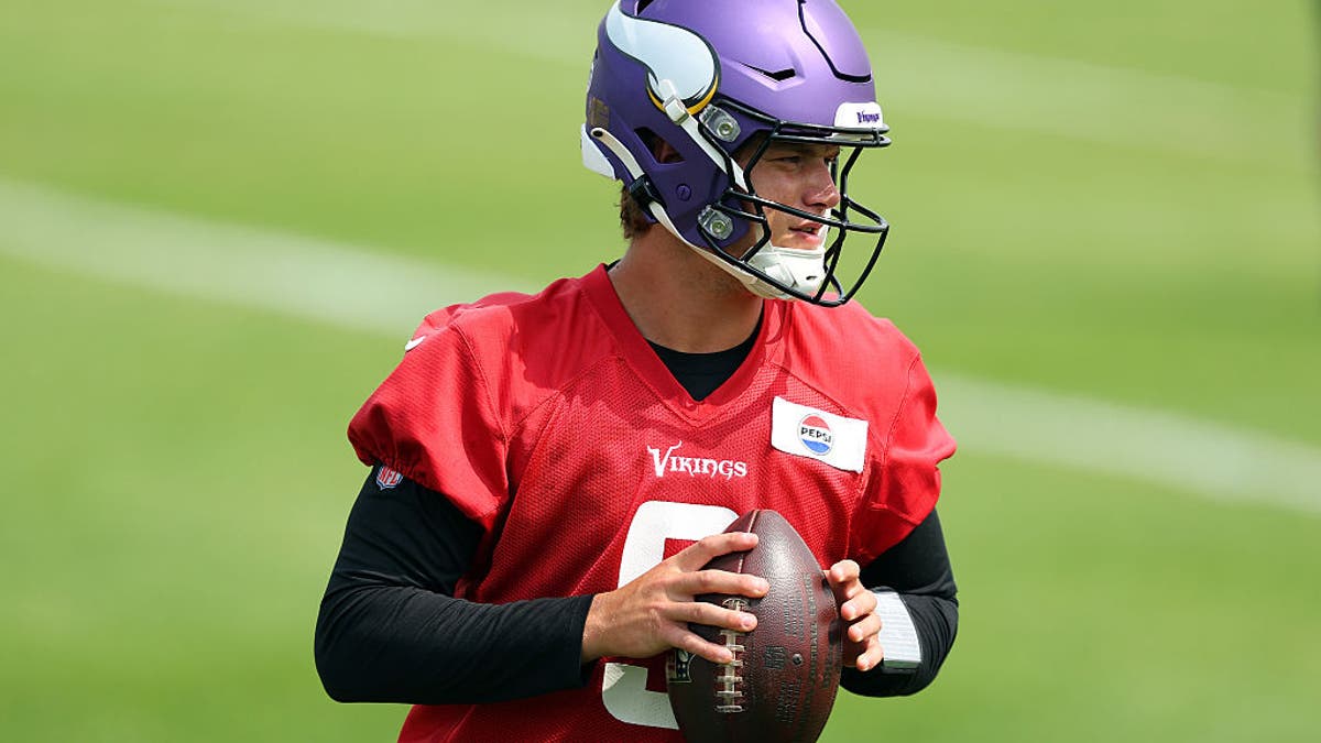 Late in training camp, J.J. McCarthy is working without some of Minnesota's top offensive playmakers. (Photo by David Berding/Getty Images)